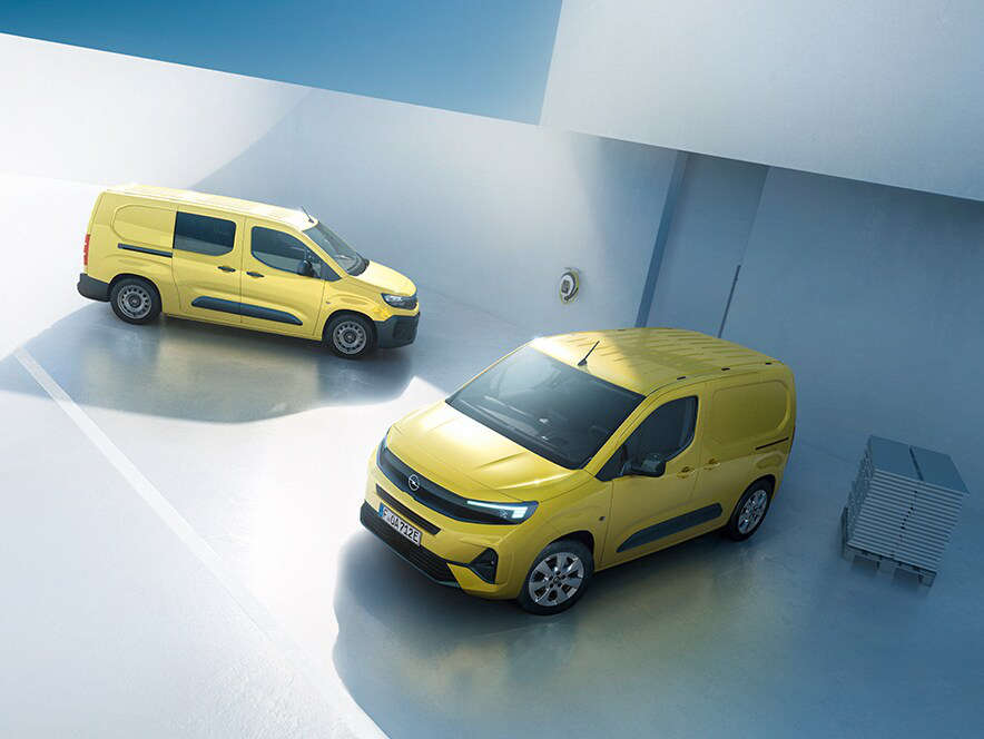 Вигляд з лівого боку на Opel Combo Cargo жовтого кольору
